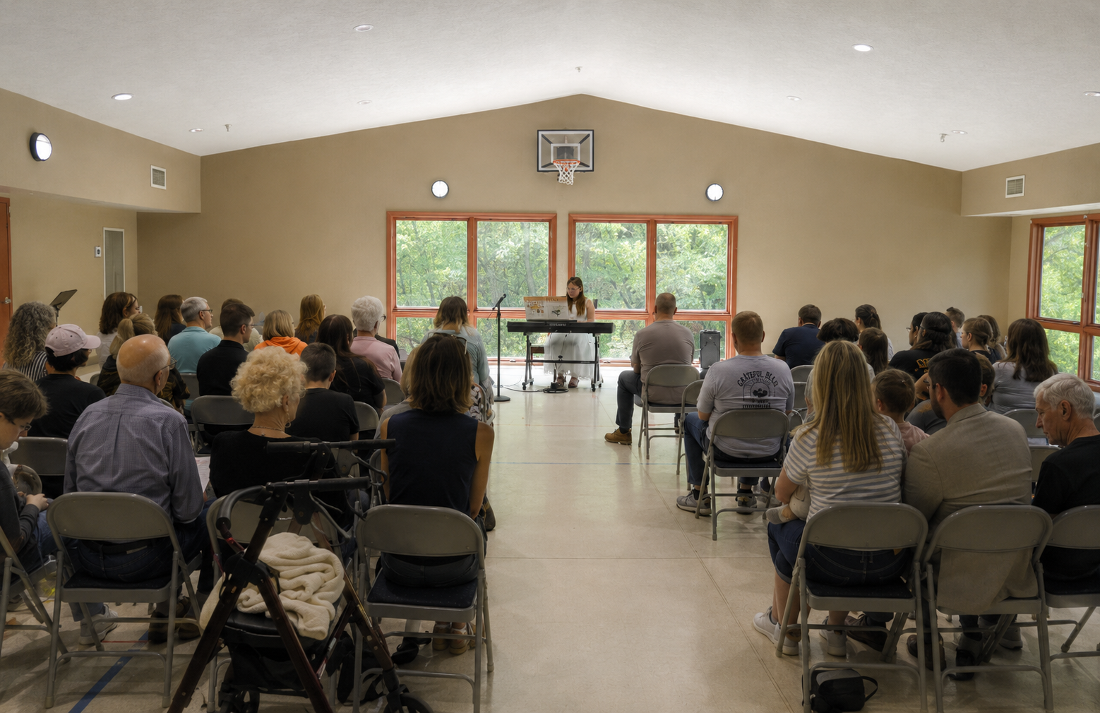 recital, wide shot